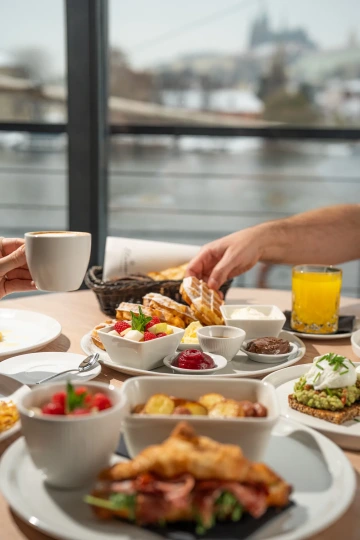 Breakfast spread with coffee, fresh juice and several dishes aboard Marina Ristorante.