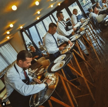The Marina Ristorante team serving guests in the restaurant.
