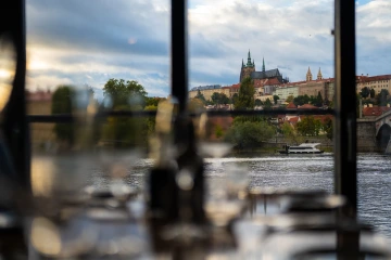 View from Marina Ristorante of Prague Castle and Charles Bridge across the Vltava.
